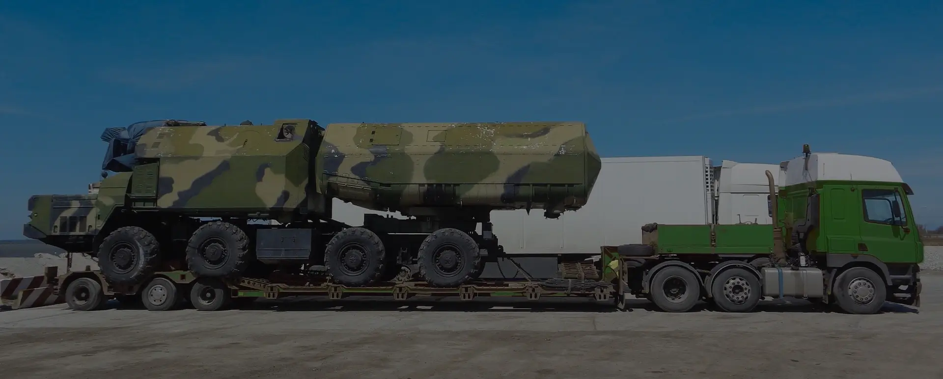 Доставка техники и ракет в селе Бакчар (Сибирский округ - Томская область) специальным воинским автотранспортом по договору